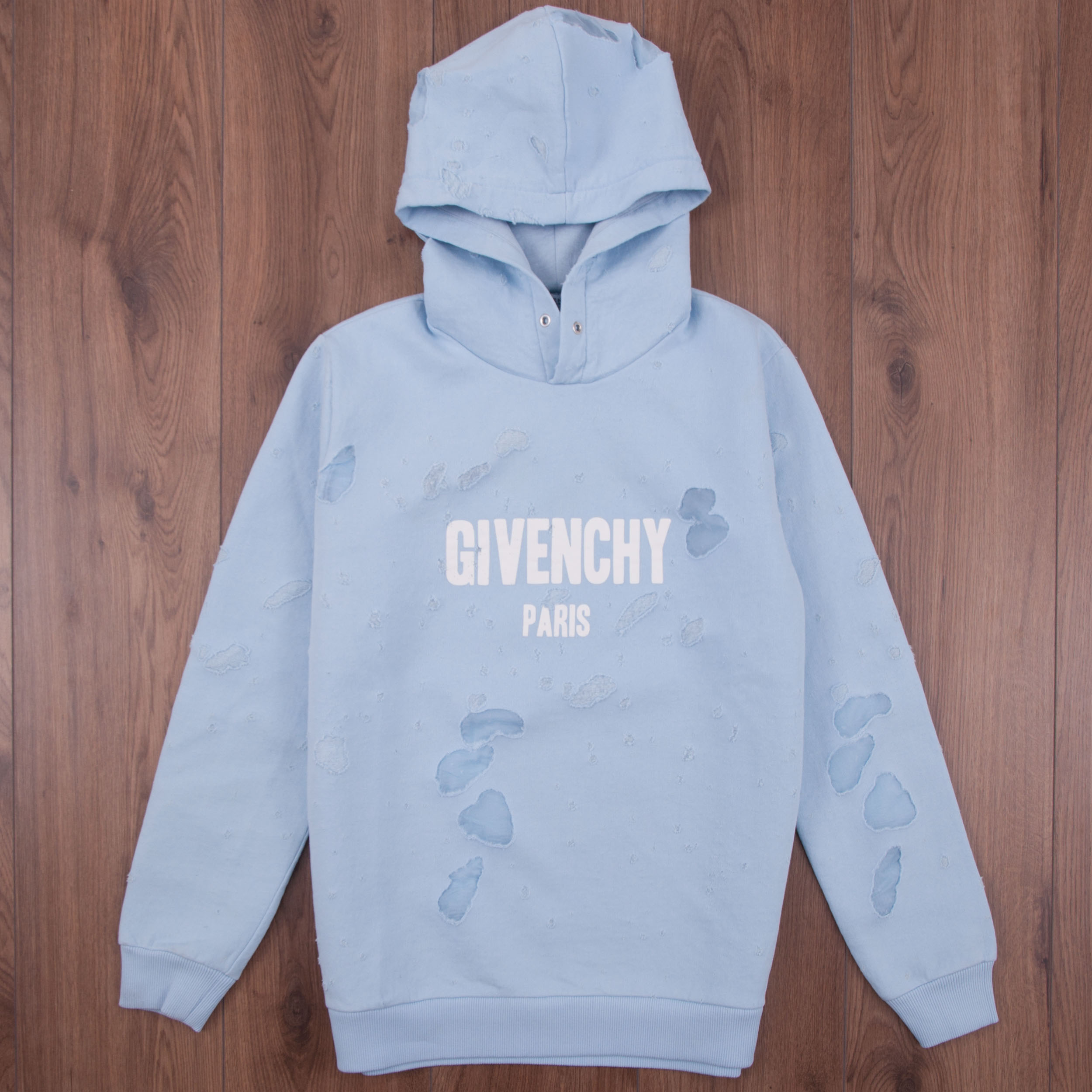 givenchy paris ripped hoodie